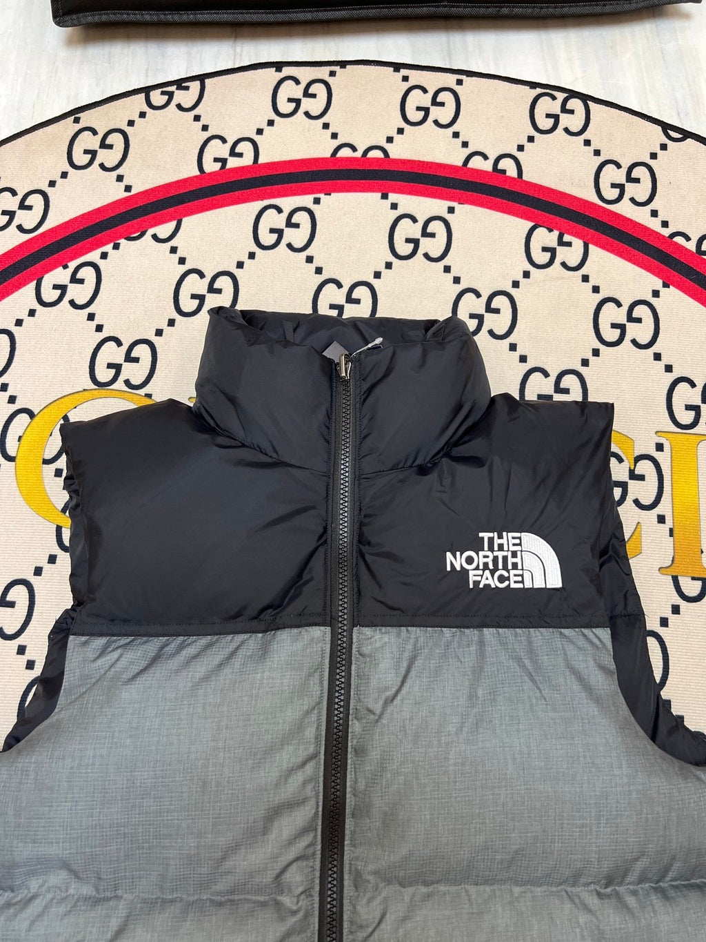 The North Face Puffer Vest in Gray and Black with Stand Collar