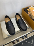 Tod's Black Leather Penny Loafers