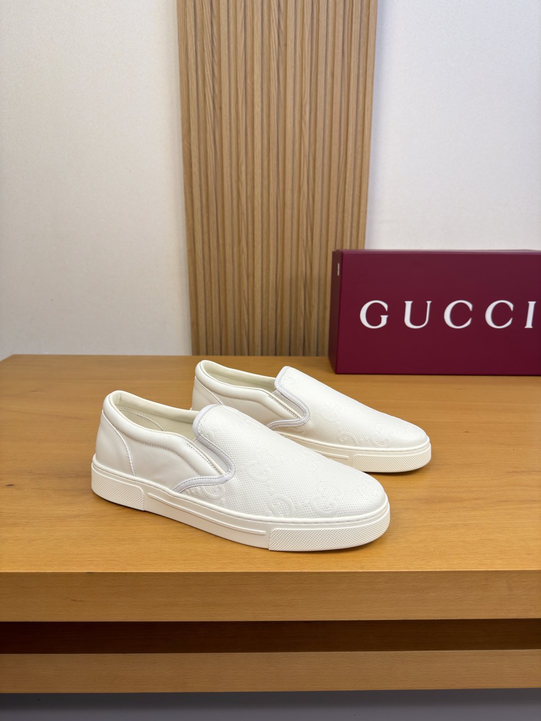 Ivory White Embossed Slip-On Sneakers