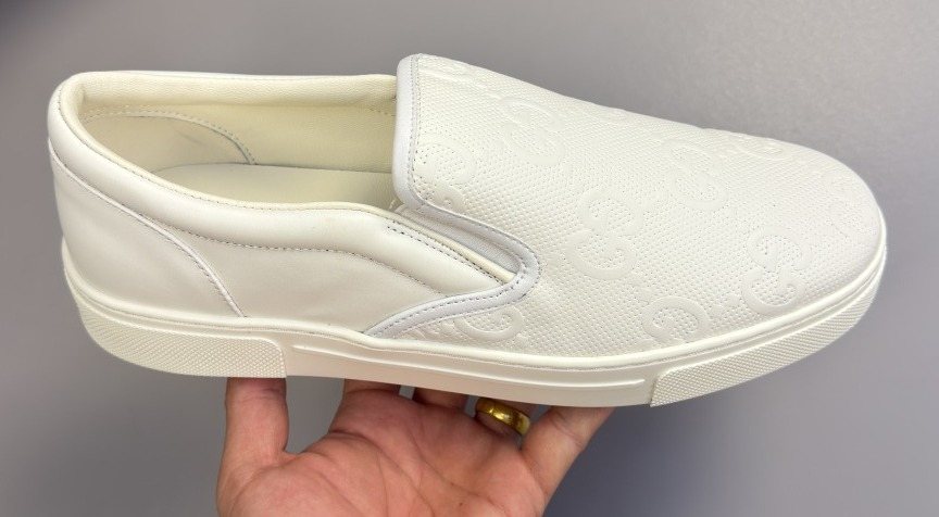 Ivory White Embossed Slip-On Sneakers