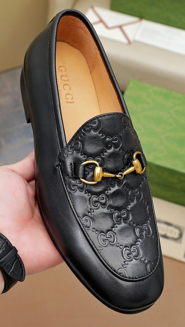 Gucci Black Embossed Loafers